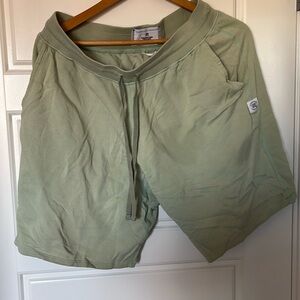 Light green shorts. Reigning Champ large